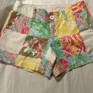 Lilly Pulitzer shorts. Fabric is a patchwork pattern with all the Lilly prints.